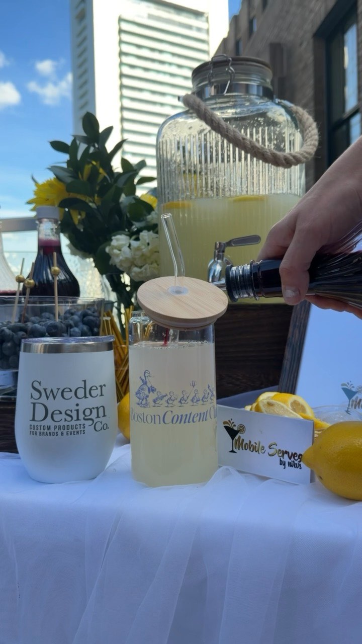 Branded tumblers at a bar